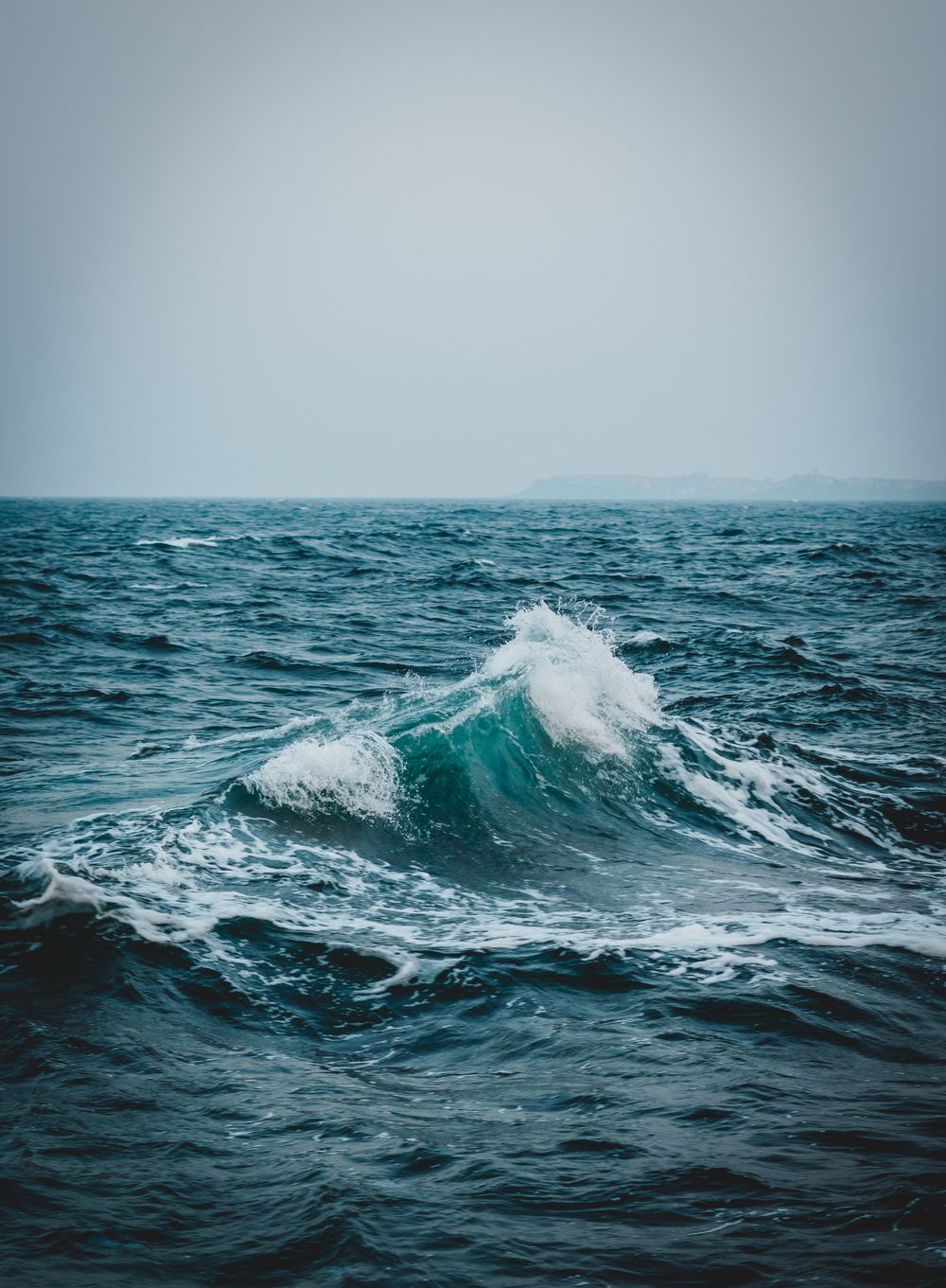 An enormous dark ocean wave