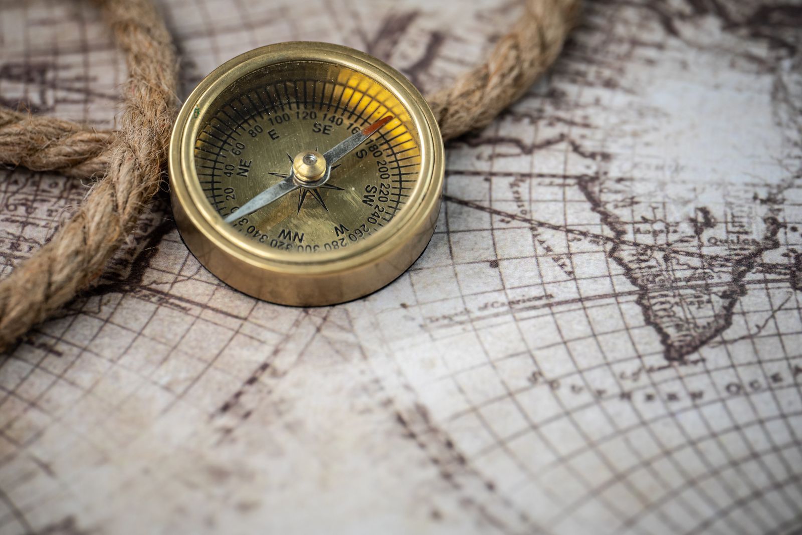 A brass and silver compass