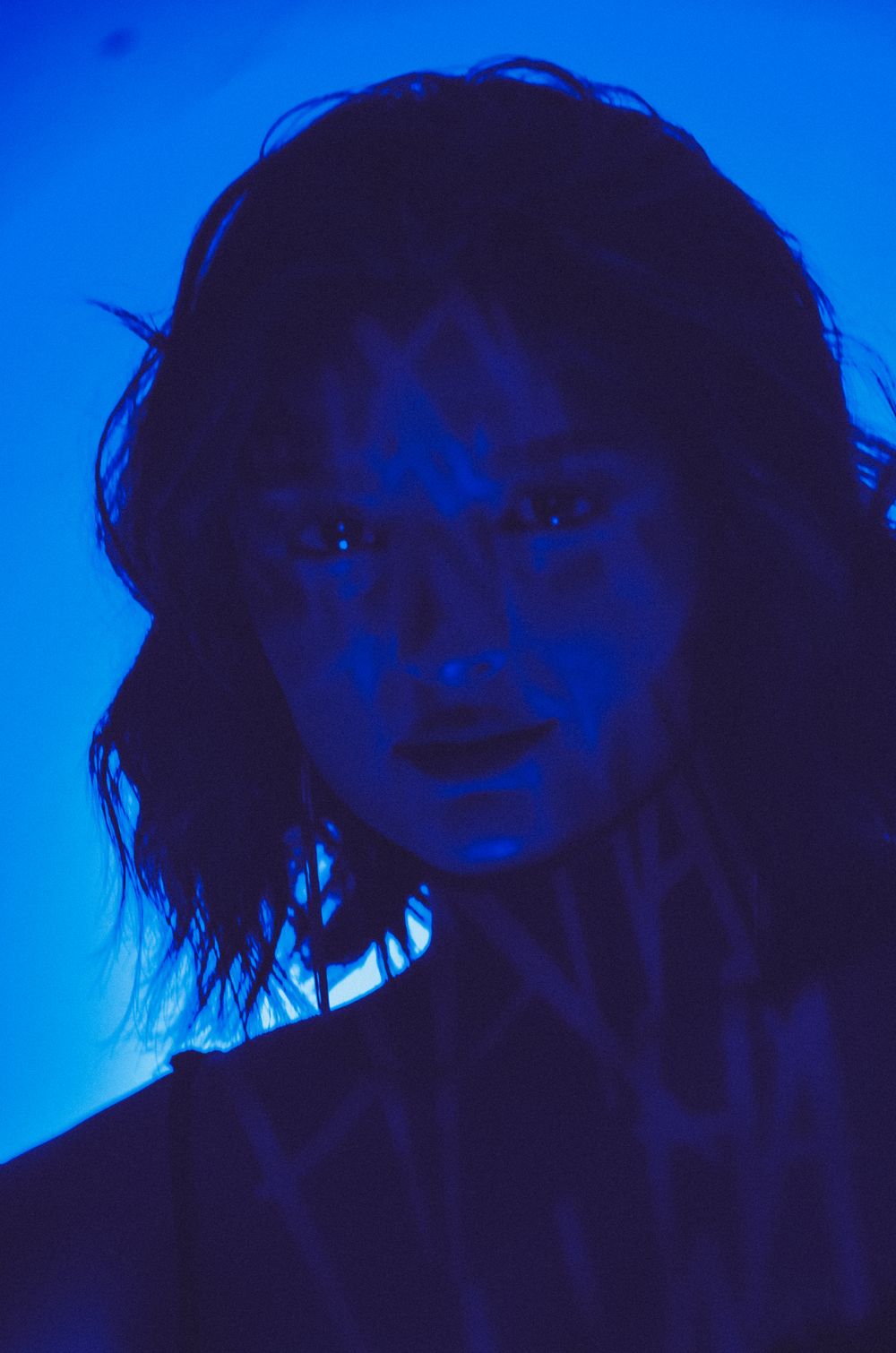 Portrait of a mage in blue light