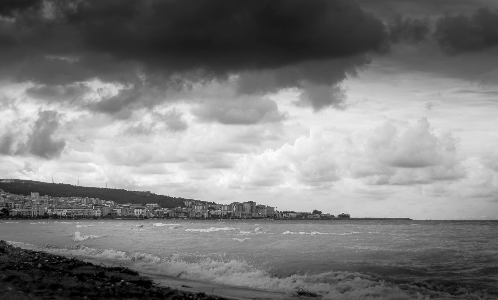 A giant wave over a city