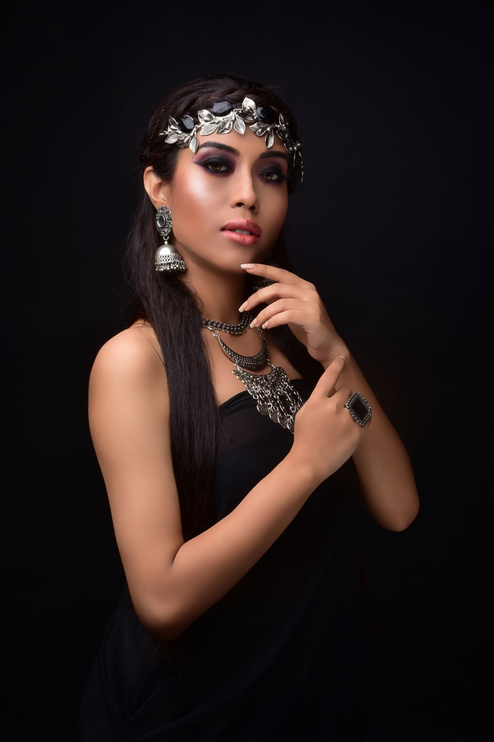 Portrait of a priestess with silver ornament
